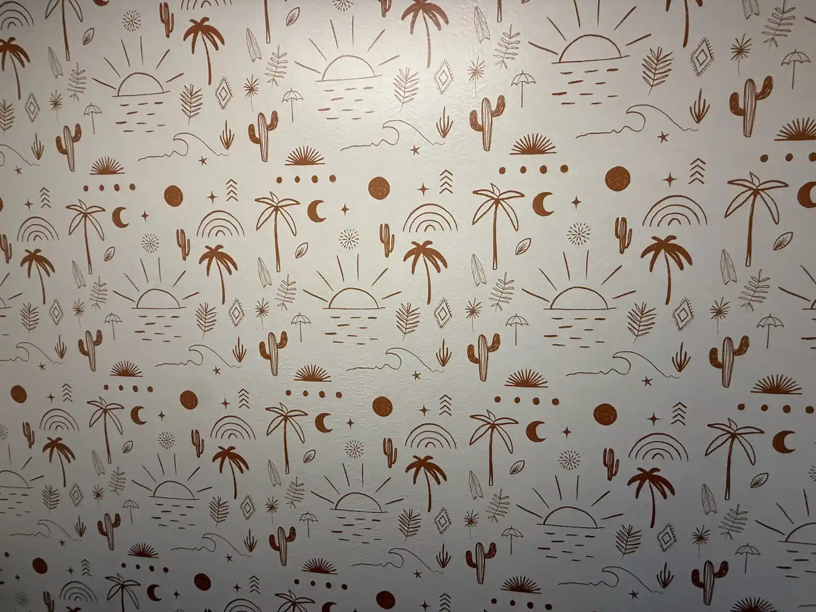 Warm botanical mural wallpaper in a furnished living room